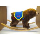 Steiff bear rocker, in brown plush with blue Steiff sash, L106cm H63cm