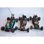 3 1/10 scale nitro radio control off road car chassis, 1 SMT (4WD), 1 Traxxus (2WD), 1 FP'S Pizazz-