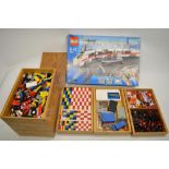 A collection of Lego including Lego bricks in 8 nicely made wooden stackable trays and a boxed