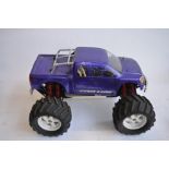 Large Pro-Line 4WD nitro powered off road radio control car. Approx length 49cm.