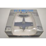 A boxed Armour Collection 1/48 diecast F6F Hellcat model (item no 98175). Top surfaces very good,