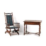 Property of a lady - a late 19th / early 20th century American rocking chair; together with an oak