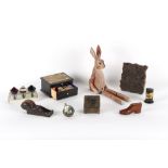 Property of a lady - a mixed lot including a carved pine articulated model of a hare, a low angle