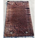 A Sirjan woollen hand-made rug with dark blue ground, 109 by 65ins. (277 by 165cms.).