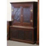 Property of a lady - an oak press cupboard, late 19th century, with carved panels depicting