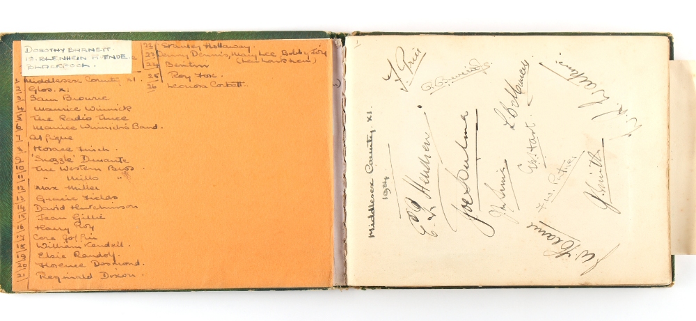 Property of a gentleman - an autograph album containing various signatures & signed photographs