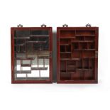A pair of Chinese hongmu or hardwood snuff bottle display cabinets, one with later added mirror