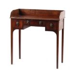 Property of a lady - an early 19th century George III / IV mahogany lowboy or washstand, with 3/4