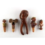 Property of a lady - a Continental carved treen nutcracker modelled as the head of a moustachioed