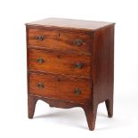 Property of a lady - a small 19th century mahogany chest of three long drawers, adapted, 24.6ins. (