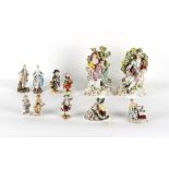 Property of a gentleman - a group of eleven Continental porcelain figures, late 19th century &