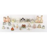 Property of a gentleman - a collection of fourteen 19th century Staffordshire models of cottages &