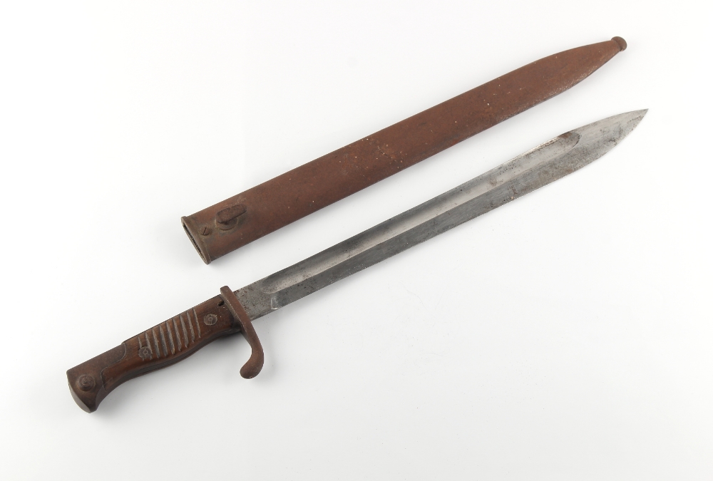 Property of a lady - a First World War German Imperial army bayonet in steel scabbard, the blade