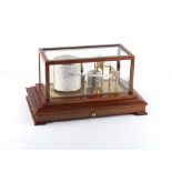 Property of a lady - a modern mechanical barograph in mahogany case, by Russell, Norwich, 15.