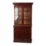 Property of a lady - a Victorian mahogany two-part chiffonier bookcase, 46ins. (117cms.) wide (