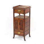 Property of a lady - an unusual late Victorian oak small cabinet with drawers & two doors