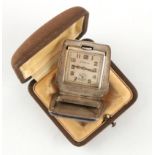 The Henry & Tricia Byrom Collection - an Eterna unmarked silver cased purse watch of folding &