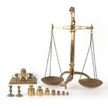 Property of a deceased estate - a set of late 19th / early 20th century brass balance scales, by
