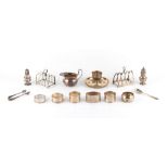 Property of a deceased estate - a quantity of assorted small silver items including two toast racks,