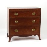 Property of a lady - an early 19th century George IV mahogany chest of three long graduated drawers,