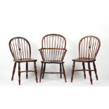 Property of a gentleman - an early 19th century fruitwood Windsor elbow chair, slight evidence of