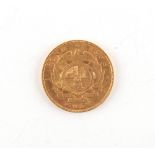 Property of a gentleman - gold coin - South Africa - an 1898 one pond coin.