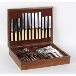 Property of a lady - a silver cutlery set for six place settings, in oak canteen, Viners,