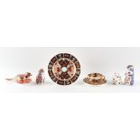 Property of a lady - four Royal Crown Derby animal paperweights; together with a Davenport imari