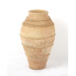 Property of a deceased estate - a Mediterranean pottery olive jar, 29.5ins. (75cms.) high.