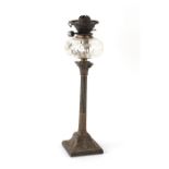 Property of a lady - a late Victorian silver plated Corinthian column oil lamp, 21.85ins. (55.5cms.)