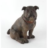 Property of a gentleman - a late 19th / early 20th century painted terracotta model of a seated Pug,