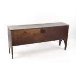 Property of a gentleman - an early 18th century oak sword chest or six plank coffer, carved with the