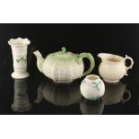 Property of a gentleman - a group of four Belleek porcelain items including a Tridacna pattern