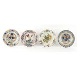 Property of a gentleman - two Delft polychrome plates, each approximately 9ins. (23cms.) diameter;