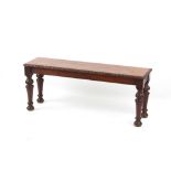 Property of a deceased estate - a late Victorian carved oak window seat, 42ins. (106.5cms.) long.