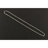 An 18ct white gold pearl necklace, the 70 pearls believed to be natural saltwater pearls and each