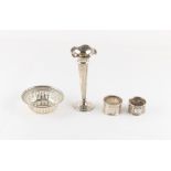 Property of a deceased estate - a silver pierced bonbon dish; together with two silver napkin rings;