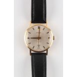 Property of a gentleman - a gentleman's Garrard 9ct gold cased automatic wristwatch, with date,