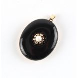 An unmarked yellow gold (tests 14ct) black enamel diamond & pearl oval pendant portrait or