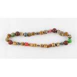 Property of a lady - a Japanese ojime bead necklace, with thirty-two various beads including