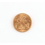 Property of a gentleman - gold coin - a 1915 George V gold full sovereign.