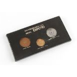 Property of a deceased estate - gold coin - an 18ct gold silver & copper three coin set