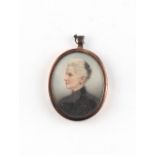 A collection of portrait miniatures - K.H., English school, late 19th century - A Lady - oval, on