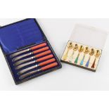 Property of a lady - a boxed set of six Norwegian silver gilt & enamel coffee spoons, by David