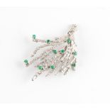 Property of a gentleman - a 14ct white gold emerald & diamond floral brooch, 61mm long,