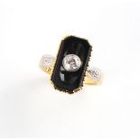 An 18ct yellow gold black onyx & diamond panel ring, approximately 7.3 grams, size N.