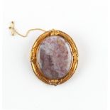 Property of a lady - a large Victorian unmarked oval framed agate brooch with lock of hair behind