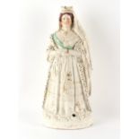 Property of a lady - a large Victorian Staffordshire figure of Queen Victoria, indistinctly titled