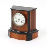The Henry & Tricia Byrom Collection - a late 19th century walnut & ebonised cased mantel clock, with