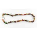 Property of a lady - a Japanese ojime bead necklace, with fifty various beads including carved